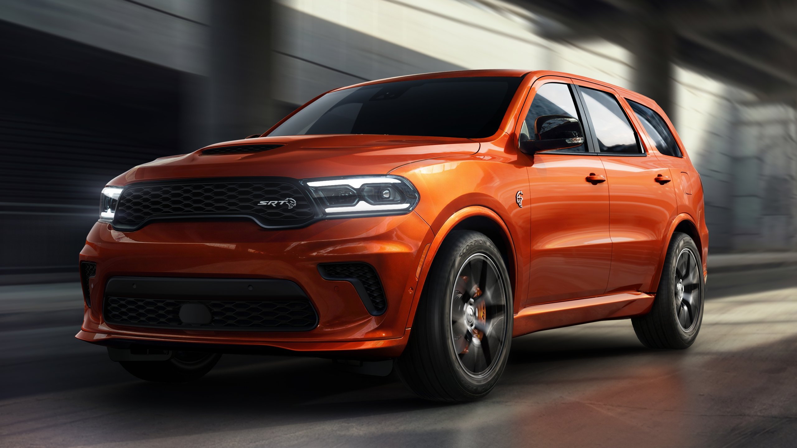 To fuel customer interest in expanded color customization, Dodge will display a 2027 Dodge Charger Scat Pack in vivid Cha Ching Green and a Dodge Durango SRT Hellcat Jailbreak painted in Toxic Orange (shown) at the brands Roadkill Nights Powered by Dodge event, showcasing the art of the possible with the new Dodge Color Jailbreak program.