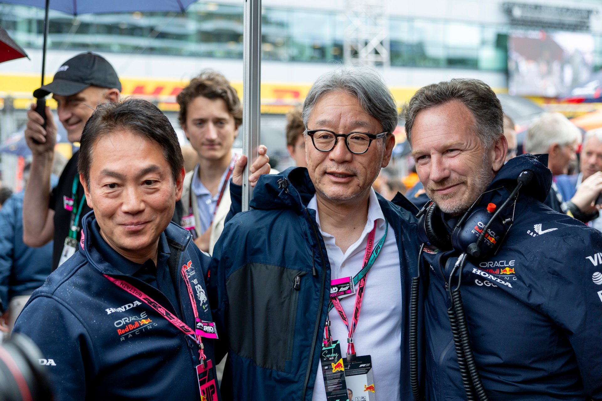 NORTHAMPTONSHIRE, ENG - JULY 06: Honda executives Koji Watanabe, President of Honda Racing Corporation, and Toshihiro Mibe, President & CEO of Honda Motor Corporation pose with Red Bull Racing Team Principal Christian Horner on the grid before the F1 Grand Prix of Great Britain on July 06, 2025 at Silverstone Circuit in Northampton, England. (Photo by Bob Kupbens/Icon Sportswire)