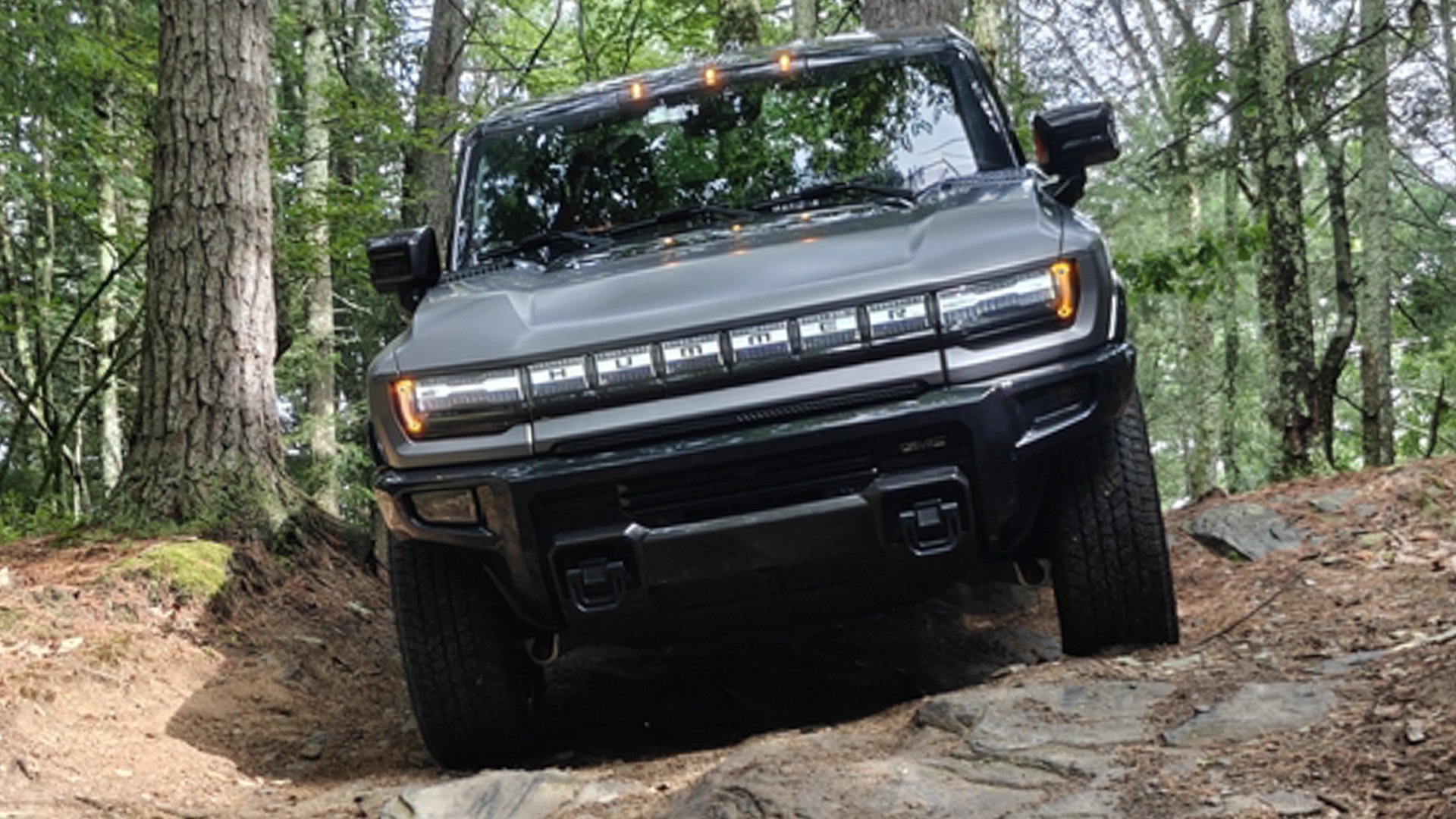 Hummer EV on an off-road trail.