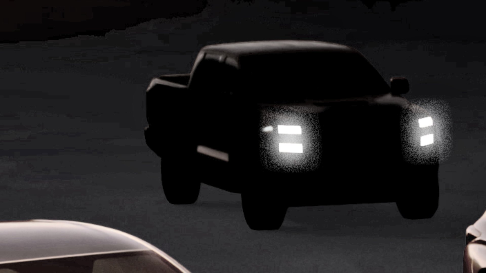 A silhouette of a pickup truck from Mitsubishi's Momentum 2030 announcement.