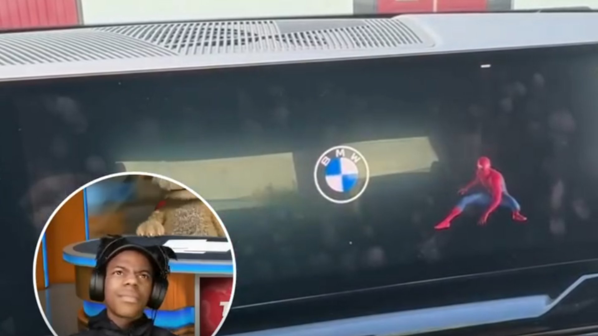 A screenshot of BMW's Spider-Man ad running on an in-car screen.