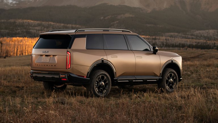 kia telluride in a field