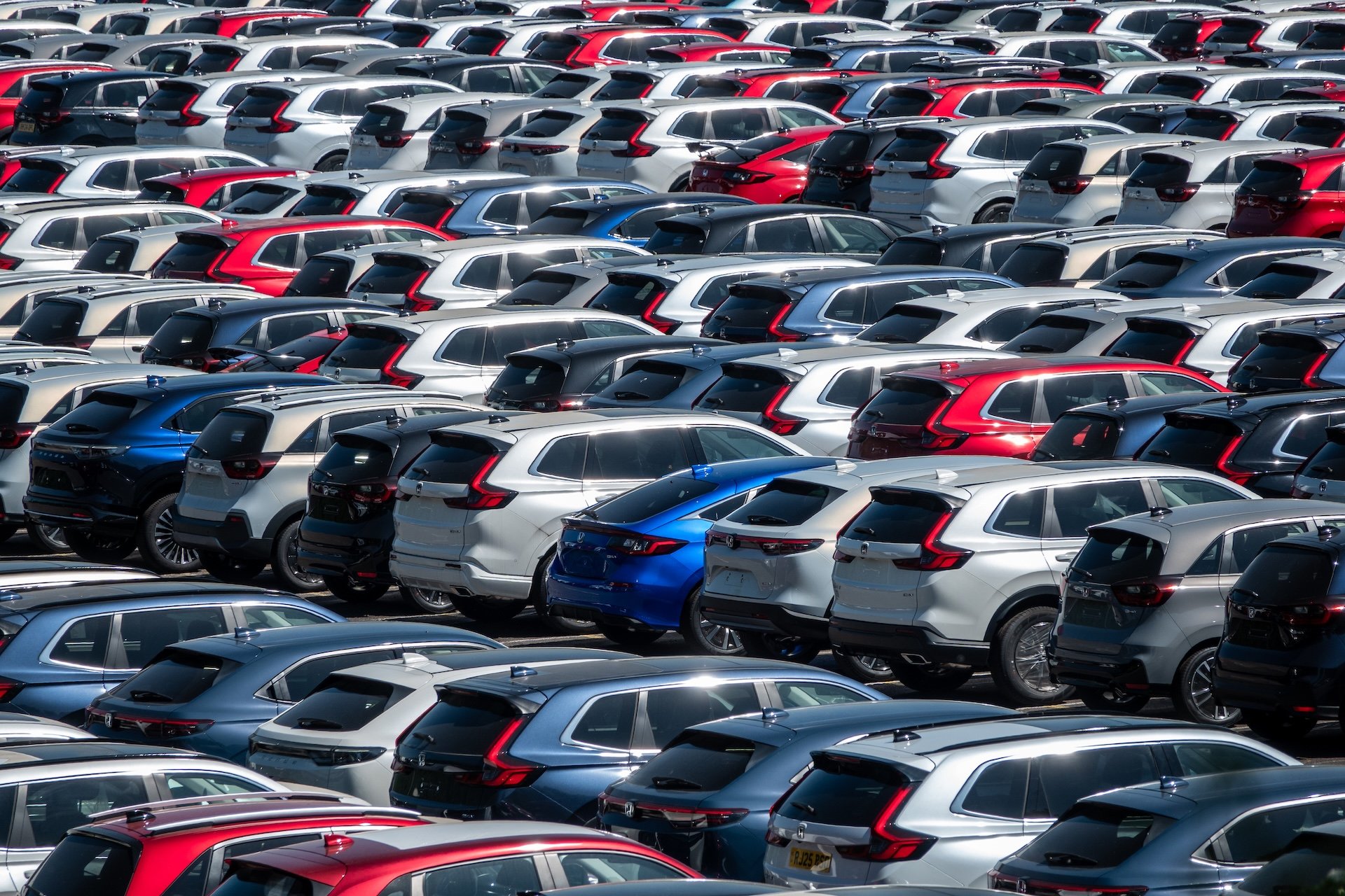 AVONMOUTH, UNITED KINGDOM - MAY 06: Recently imported brand new unregistered Honda cars are parked in a storage yard as they wait delivery to car dealerships at the Port of Bristol on May 6, 2025 near Bristol, England. After US President Donald Trump announced a series of new import tariffs, claiming these will boost American manufacturing and protect jobs, the world economy has been thrown into chaos and uncertainty. (Photo by Anna Barclay/Getty Images)
