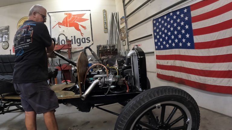 Ford Model T with a turbocharger in a garage