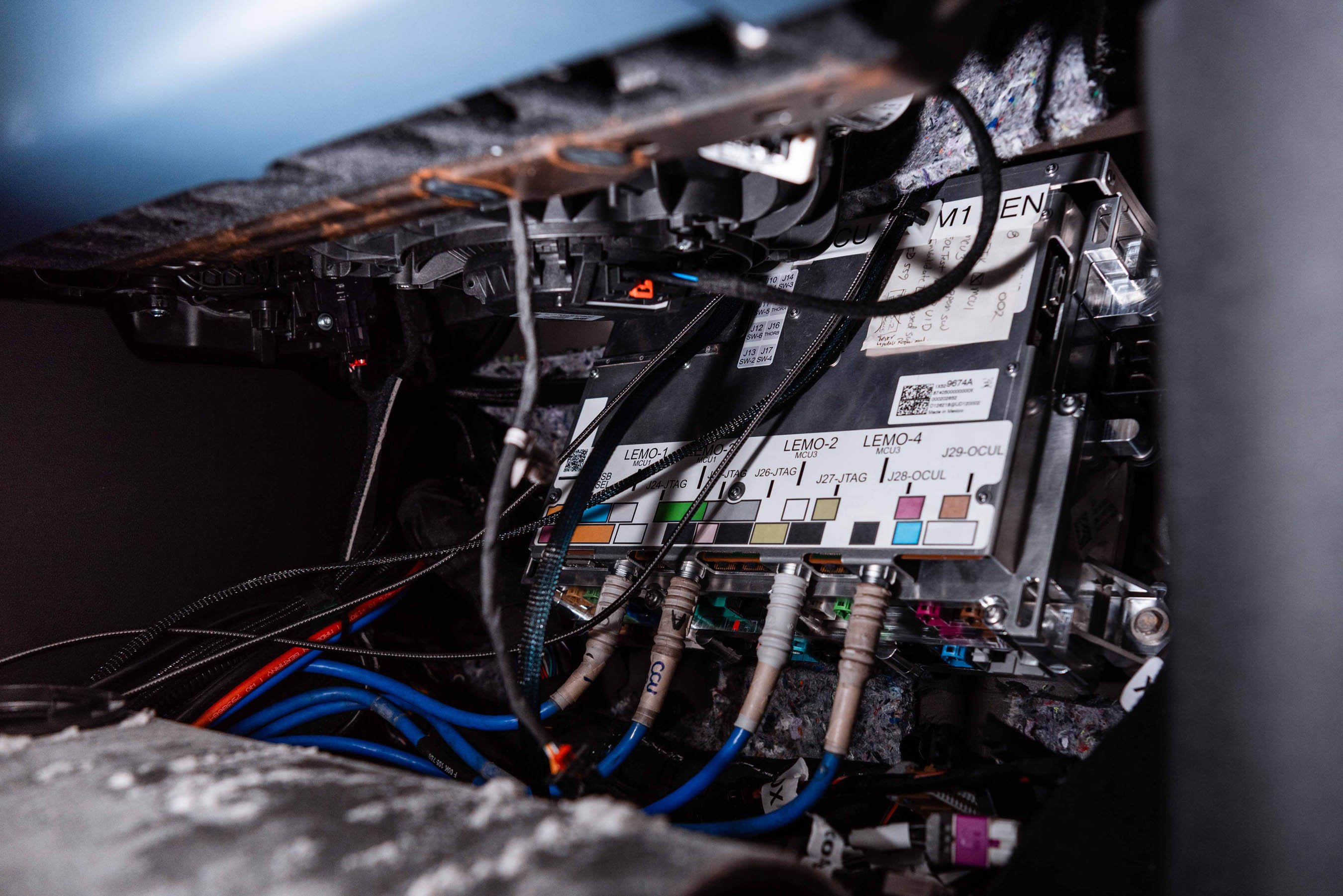 General Motors CCU being hand-installed in pre-production vehicle