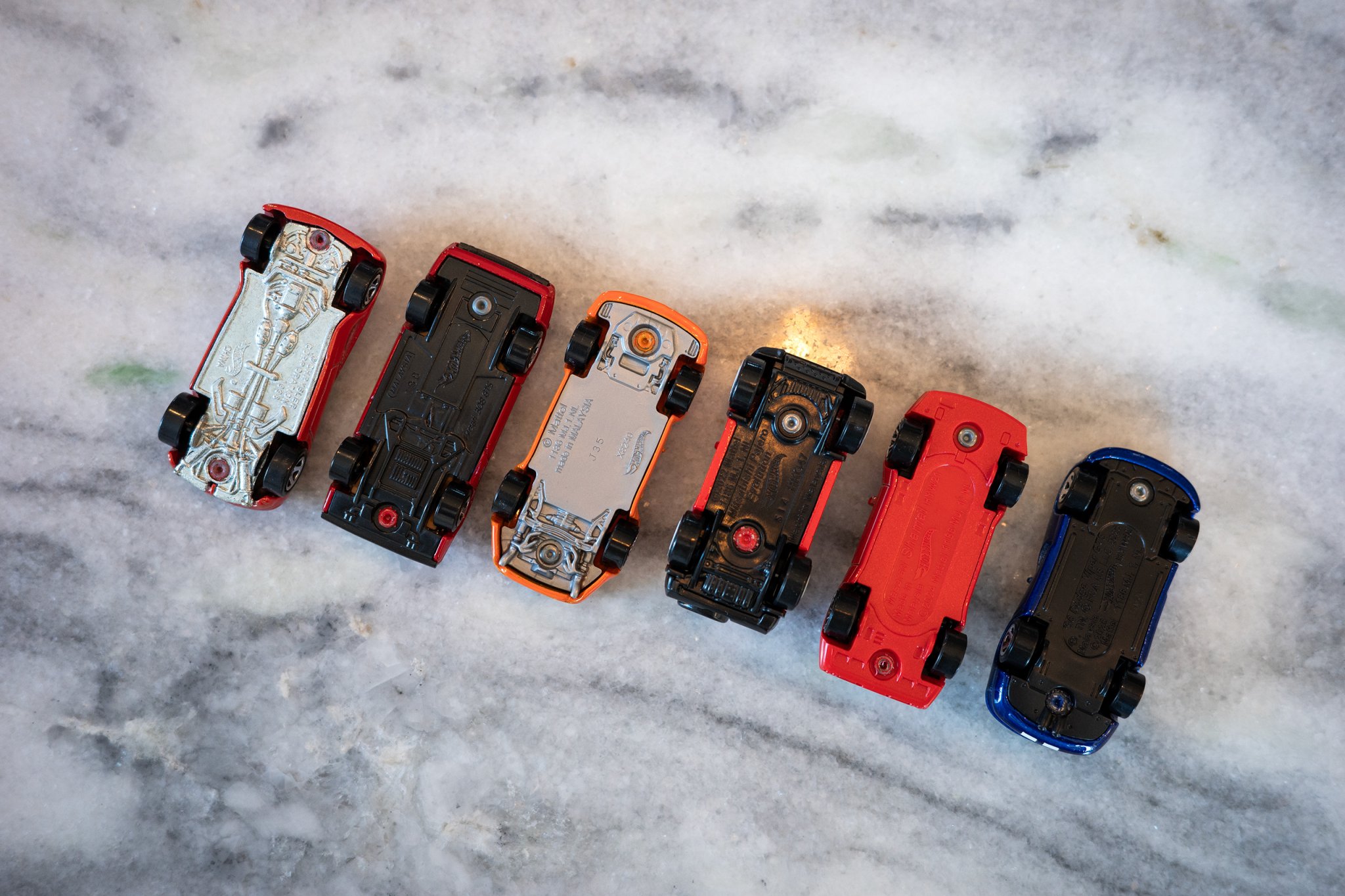 Mainlines from left: Dodge Copperhead (1998), Ferrari 308 GTS (2009), Porsche 993 GT2 (2013), Mitsubishi Pajero Evolution (2022), Maserati Shamal (2024), Dodge