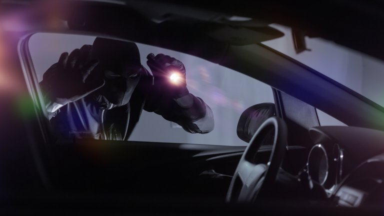 Dude stealing a car.