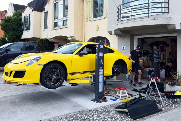 Disappearing Driveway Lift Setup in the Middle of the City Is a Genius Home Mechanic Move
