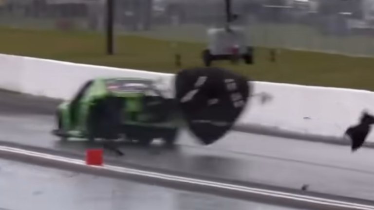 The Snot Rocket Mustang's left rear tire explodes after being struck by debris at Bradenton Motorsports Park.
