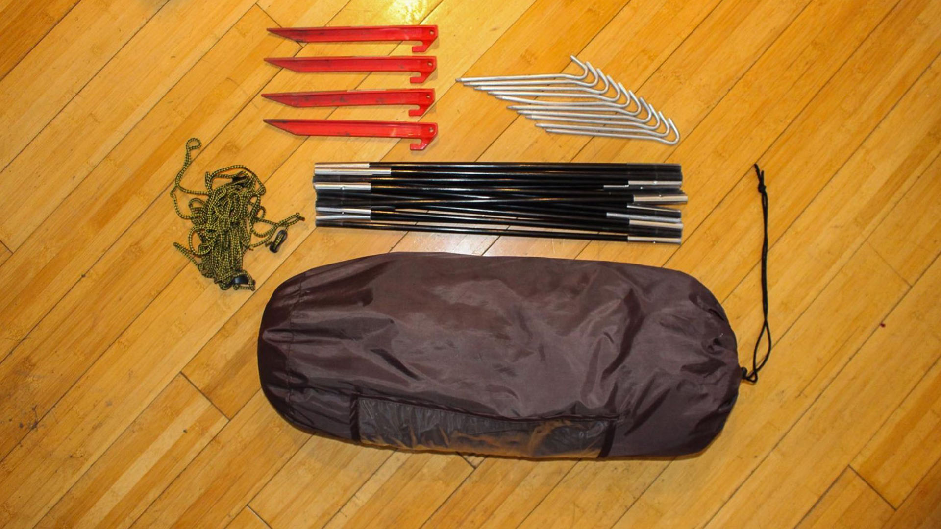 A tent provides an alternative place to sleep other than the car.