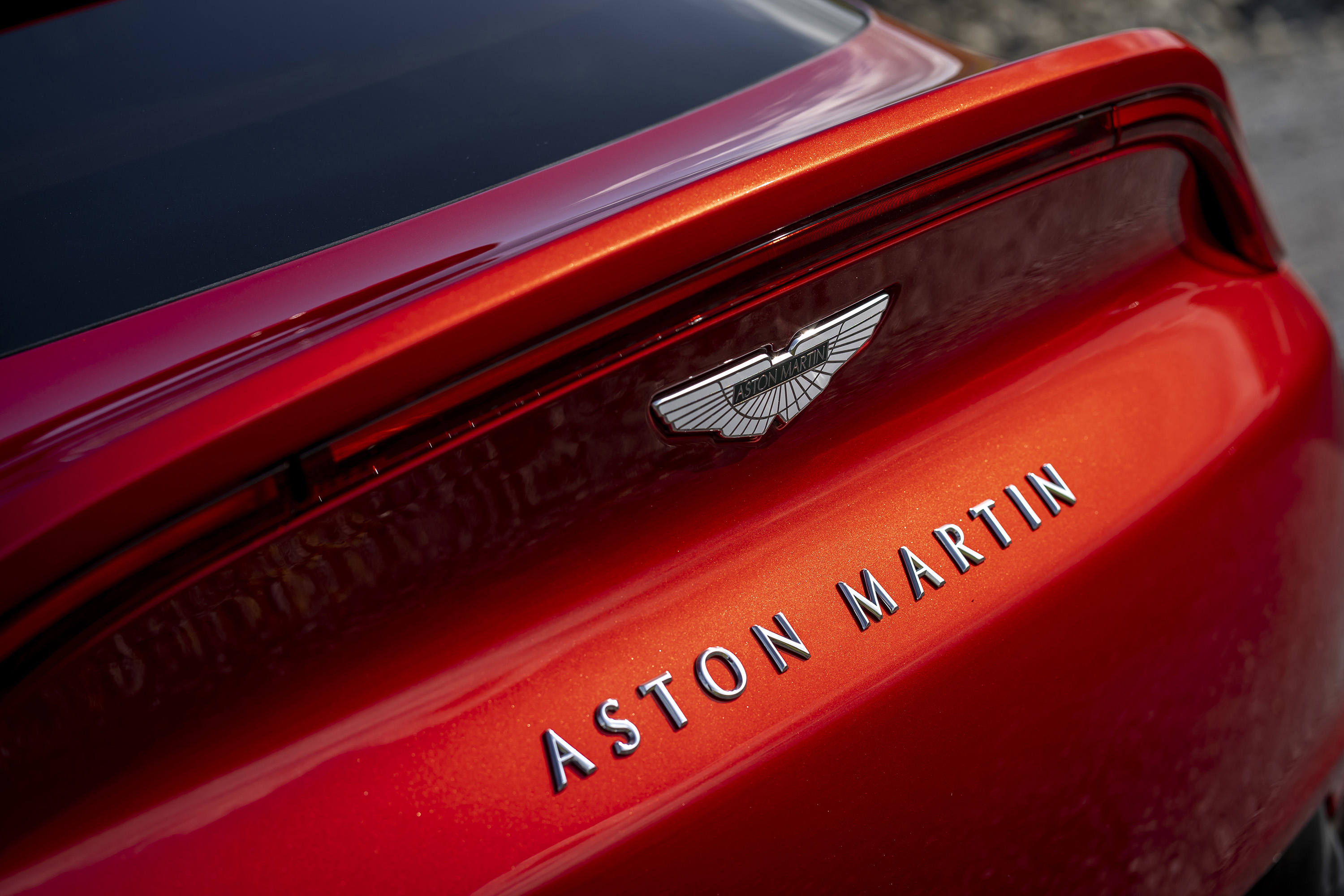 message-editor%2F1603897276241-aston_martin_dbx__hyper_red__a1_aml__259-jpg.jpg