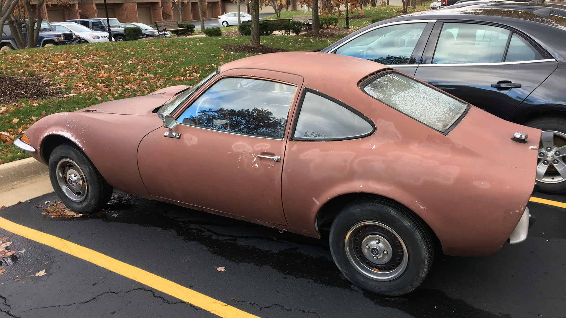 A 1970 Opel GT in a parking lot.