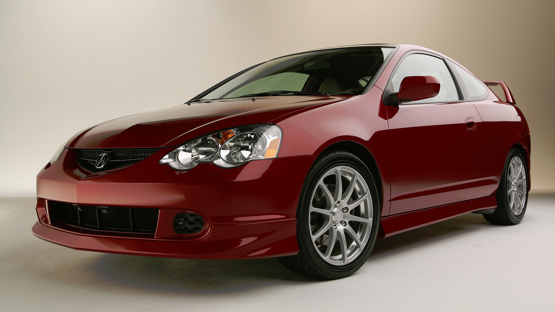 Front quarter studio photos of the 2003 Acura RSX Type S Performance Package.