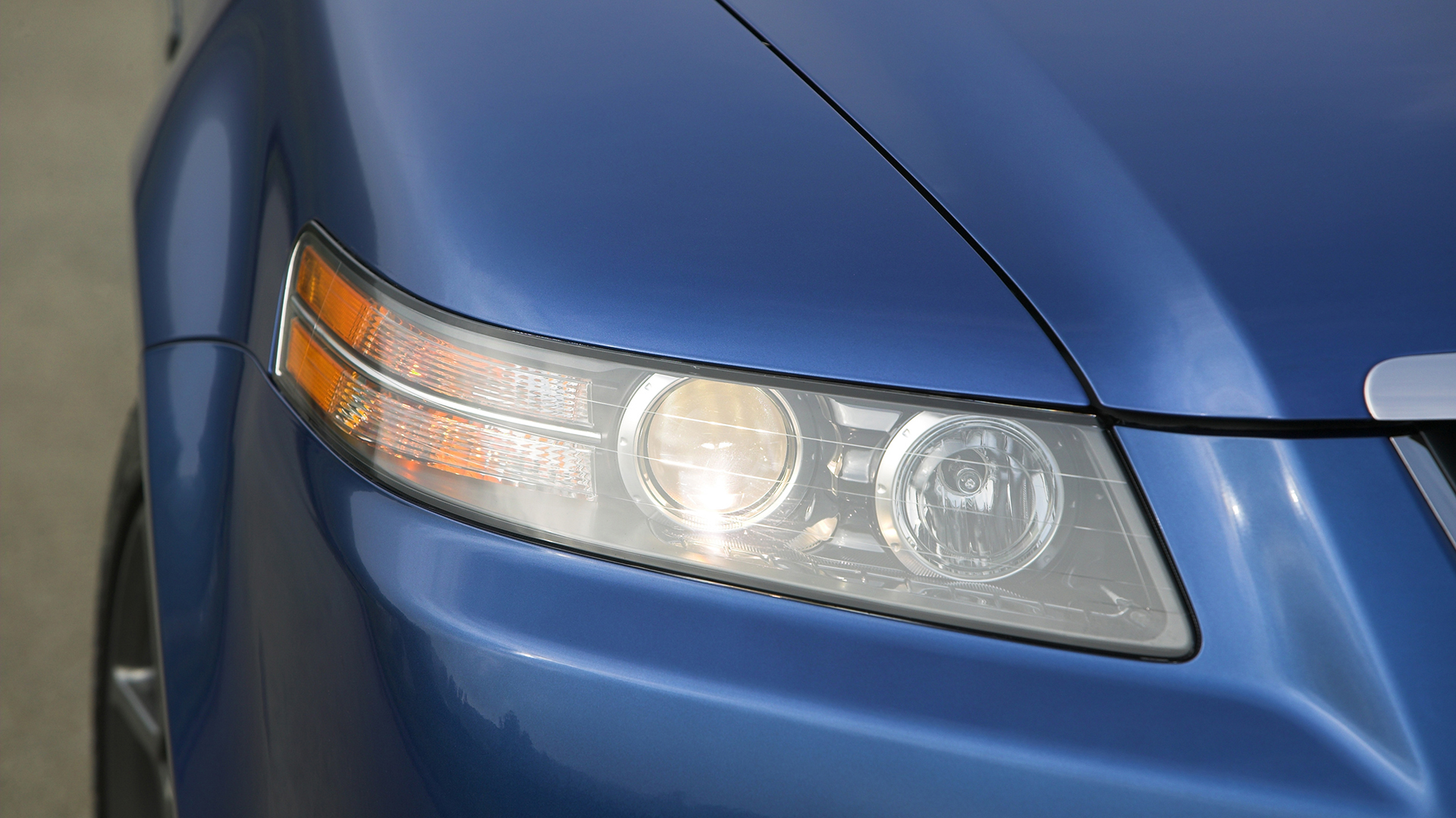 The headlight of a 2007-2008 Acura TL Type S.