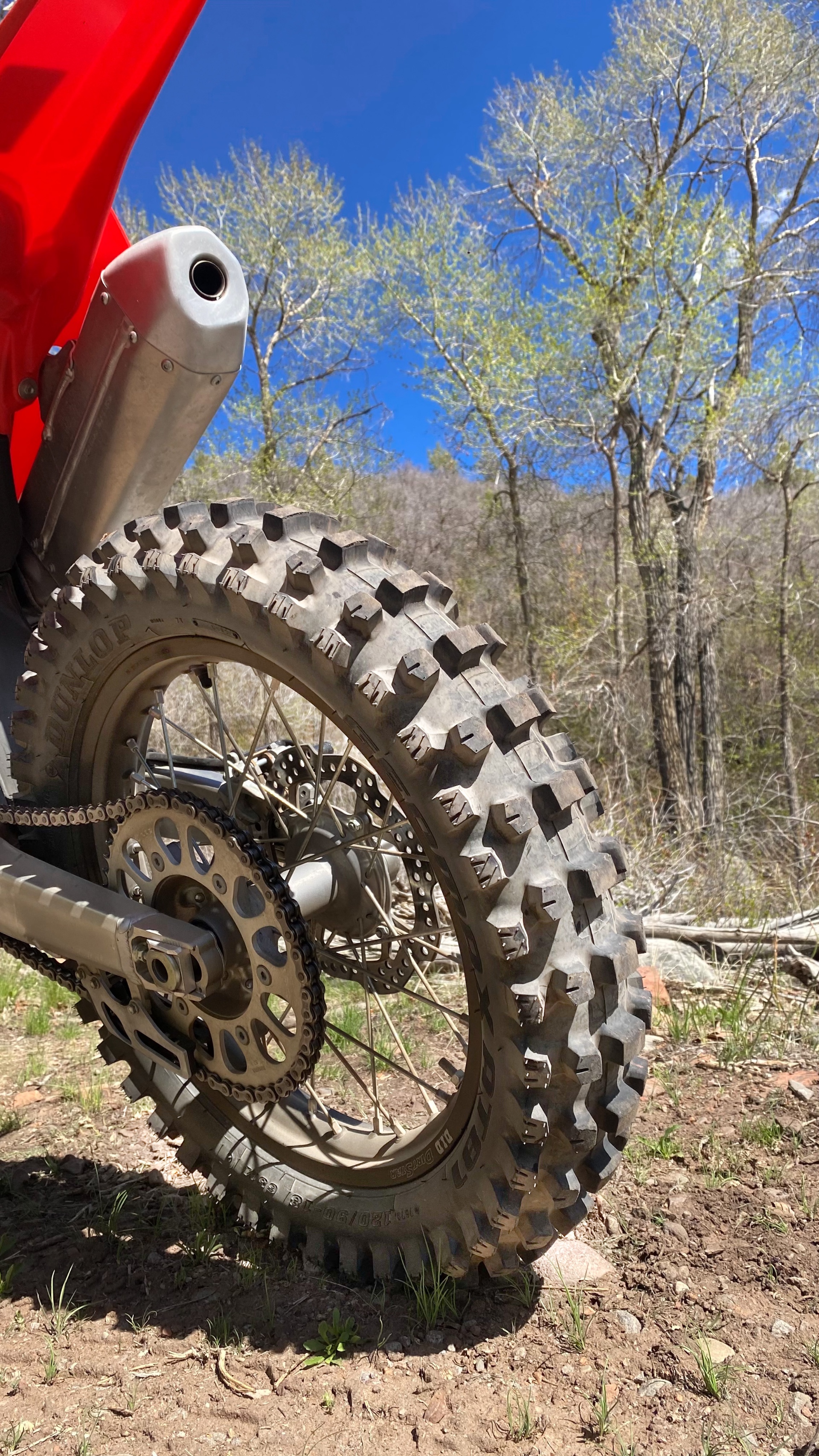 The swingarm connected to the rear wheel of the CRF450RX