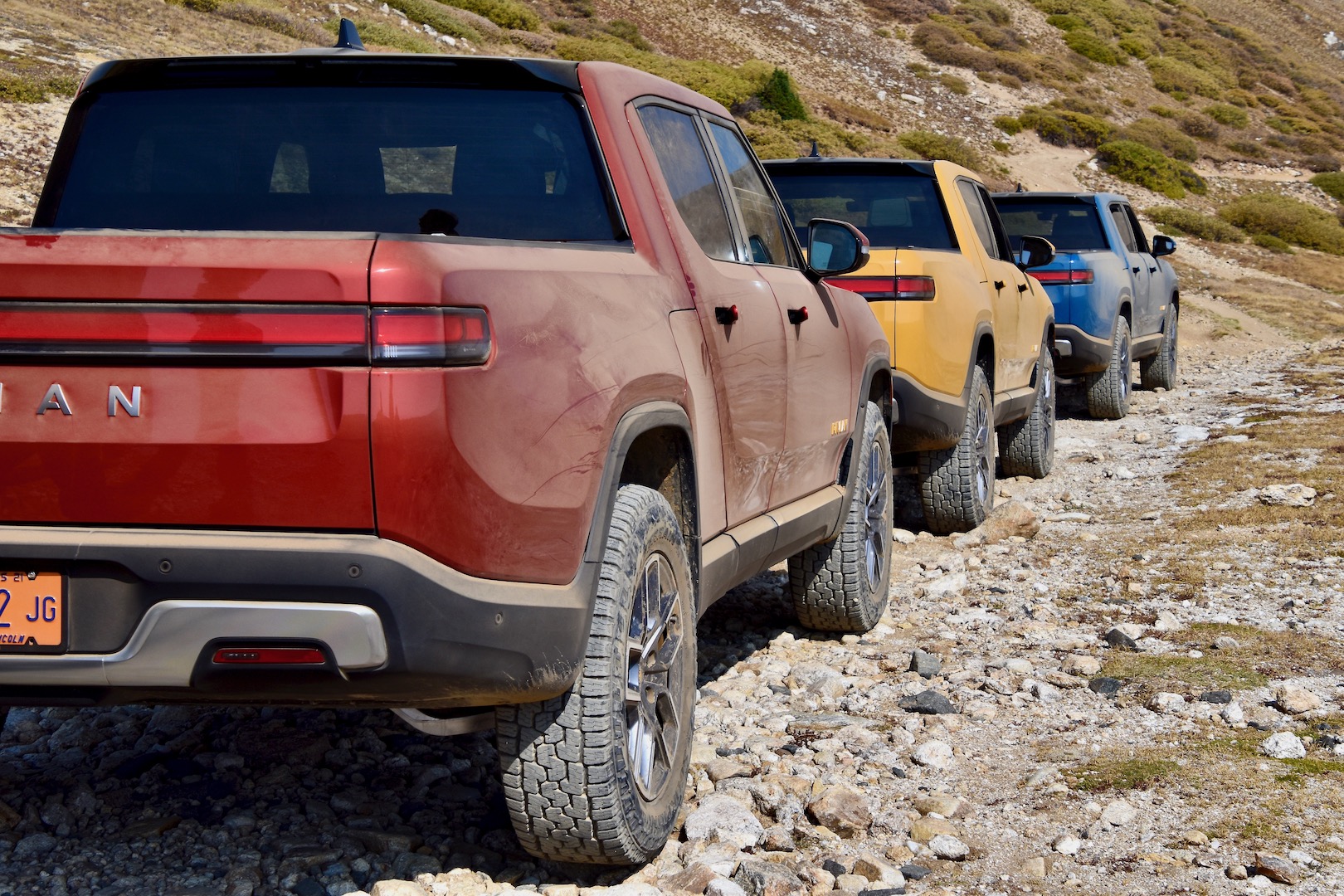 2022 Rivian R1T Launch Edition in red, yellow, and blue