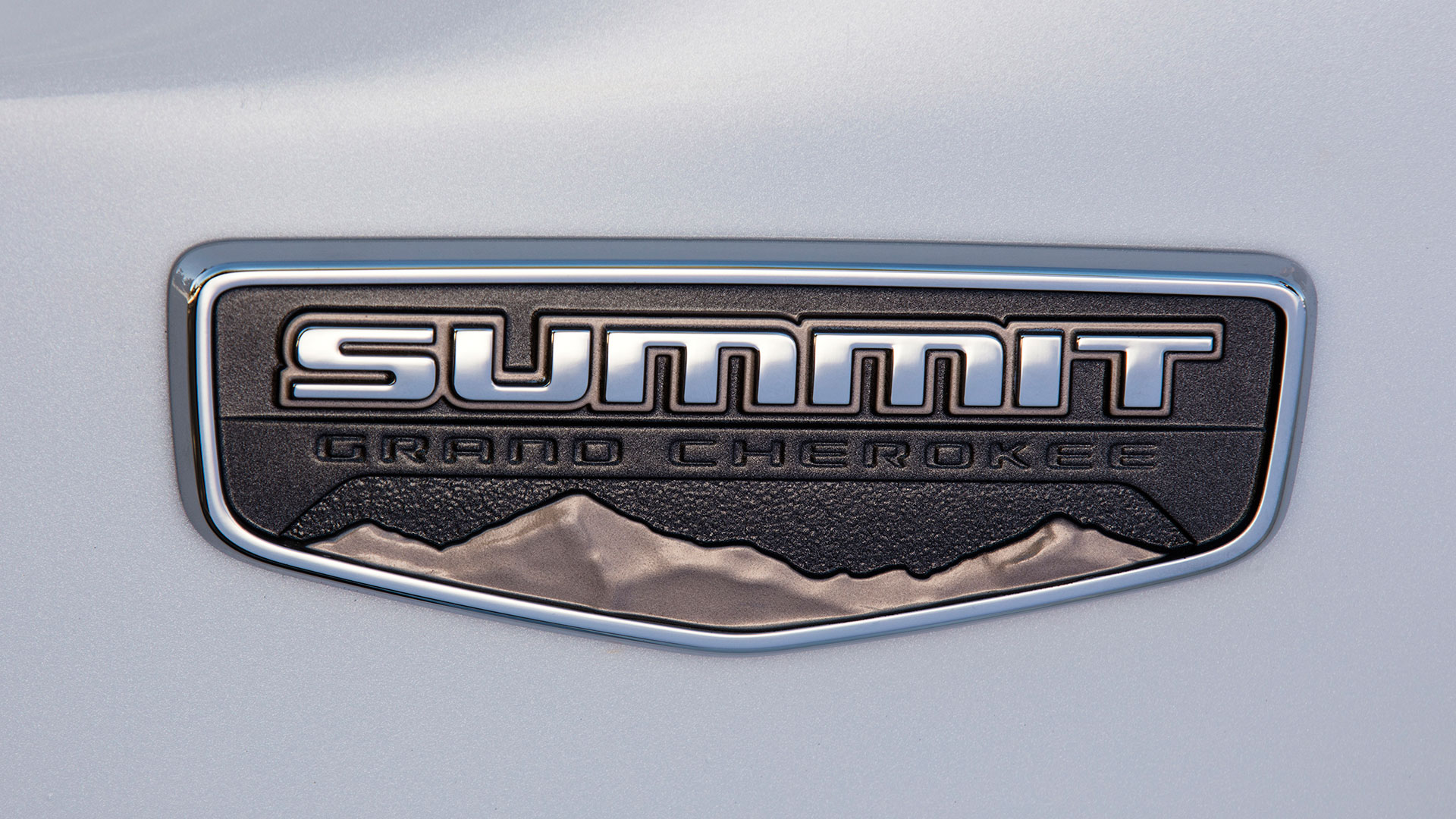 jeep-grand-cherokee-summit-review-mike-spinelli-badge.jpg