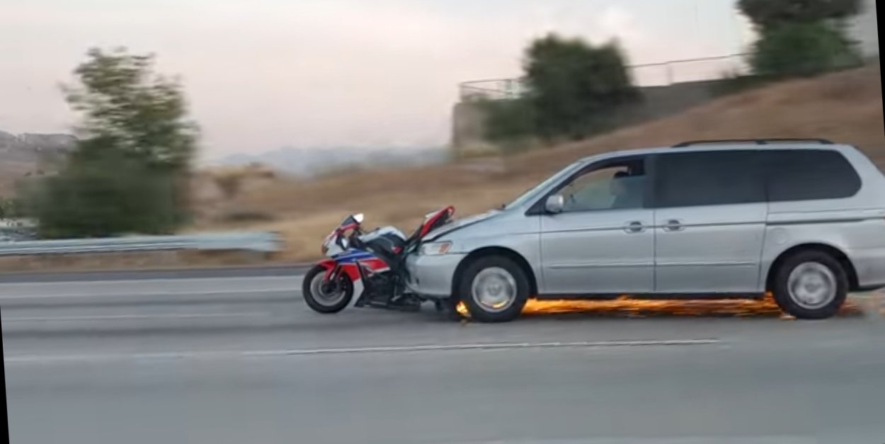 Hit-and-Run Driver Wearing Motorcycle as a Hood Ornament Captured on Video