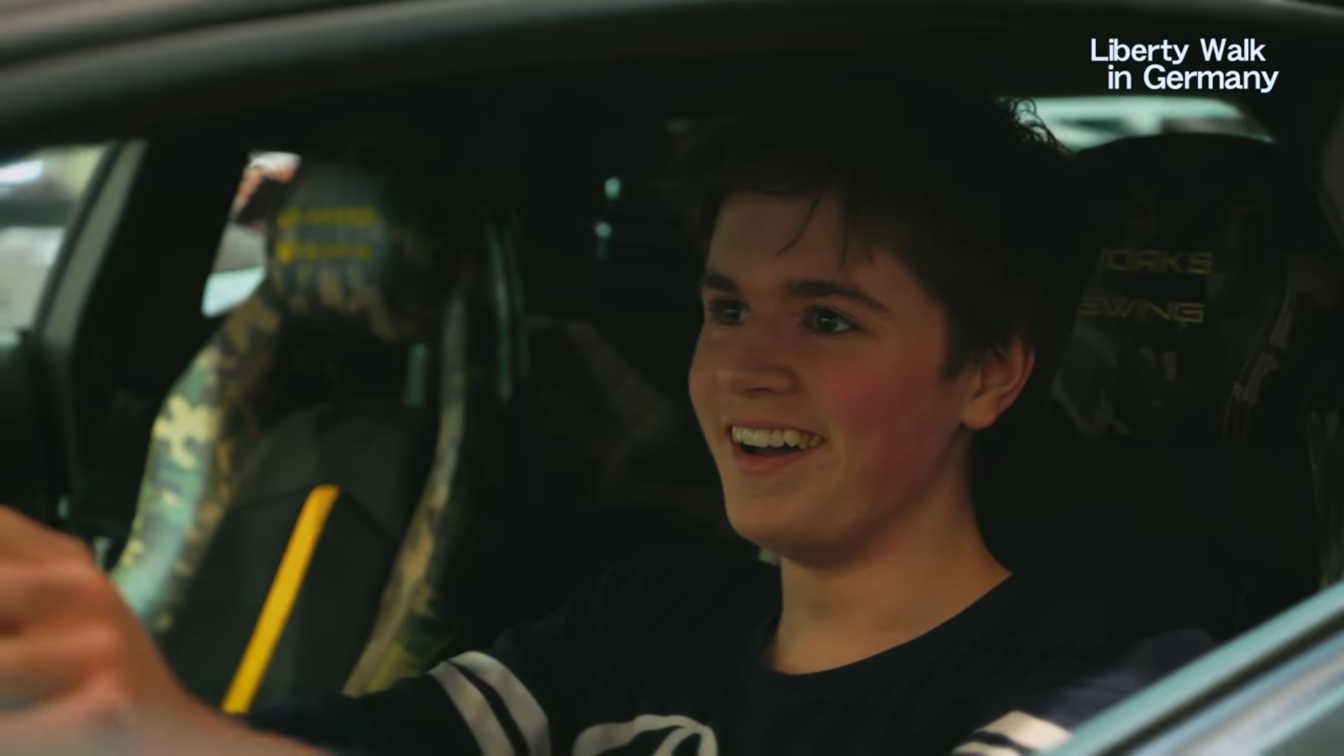 A lucky kid gets his dirty mitts on the Liberty Walk Lamborghini Aventador