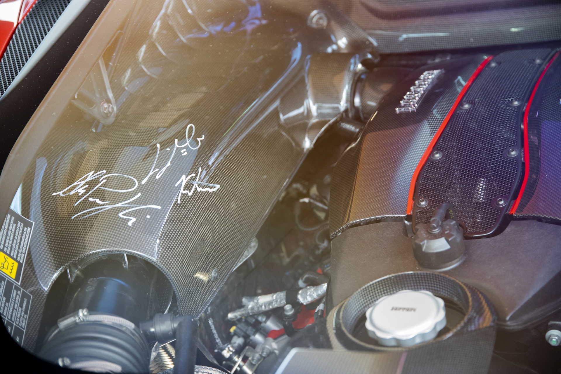 message-editor%2F1529125350844-specialeditionpilotiferrari488pistareservedforracingdriversonly-launch-enginebay.jpg