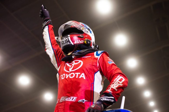 Bell advances to main event with feature win.
